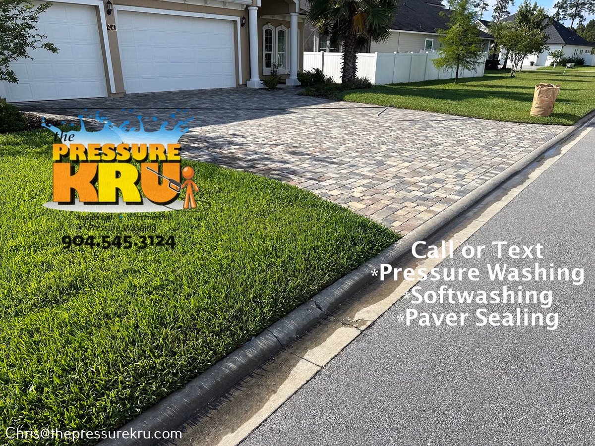 Heavily stained paver driveway before cleaning in Cimarrone.
