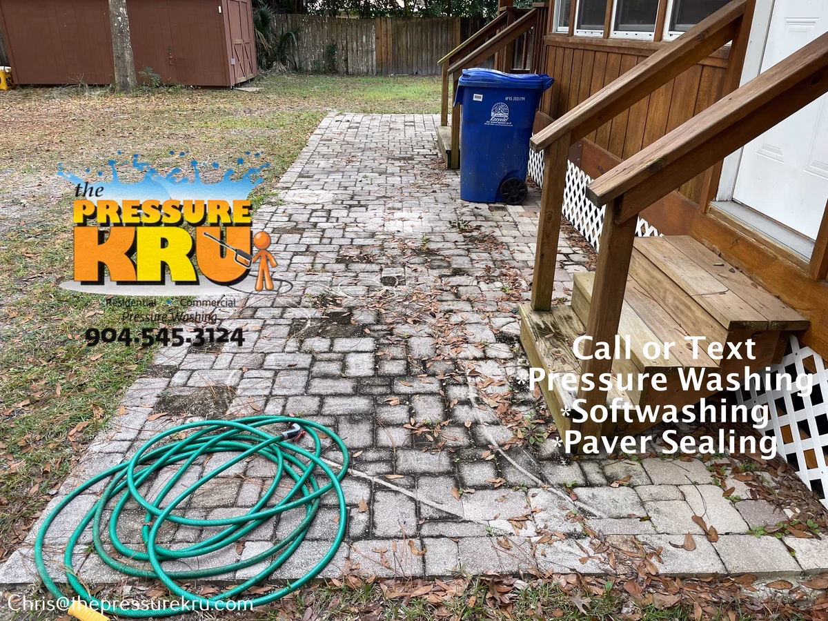 Residential paver patio cleaning in Durbin Crossing before.