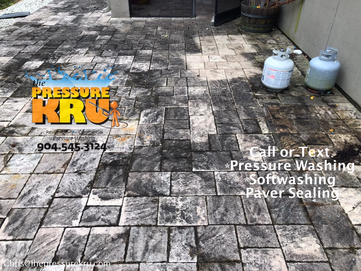 Pressure washing back yard paver patio in Cimarrone before.