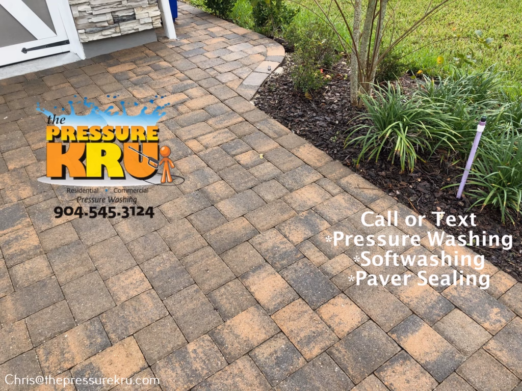 Clean restored paver driveway after professional pressure washing in Rivertown.