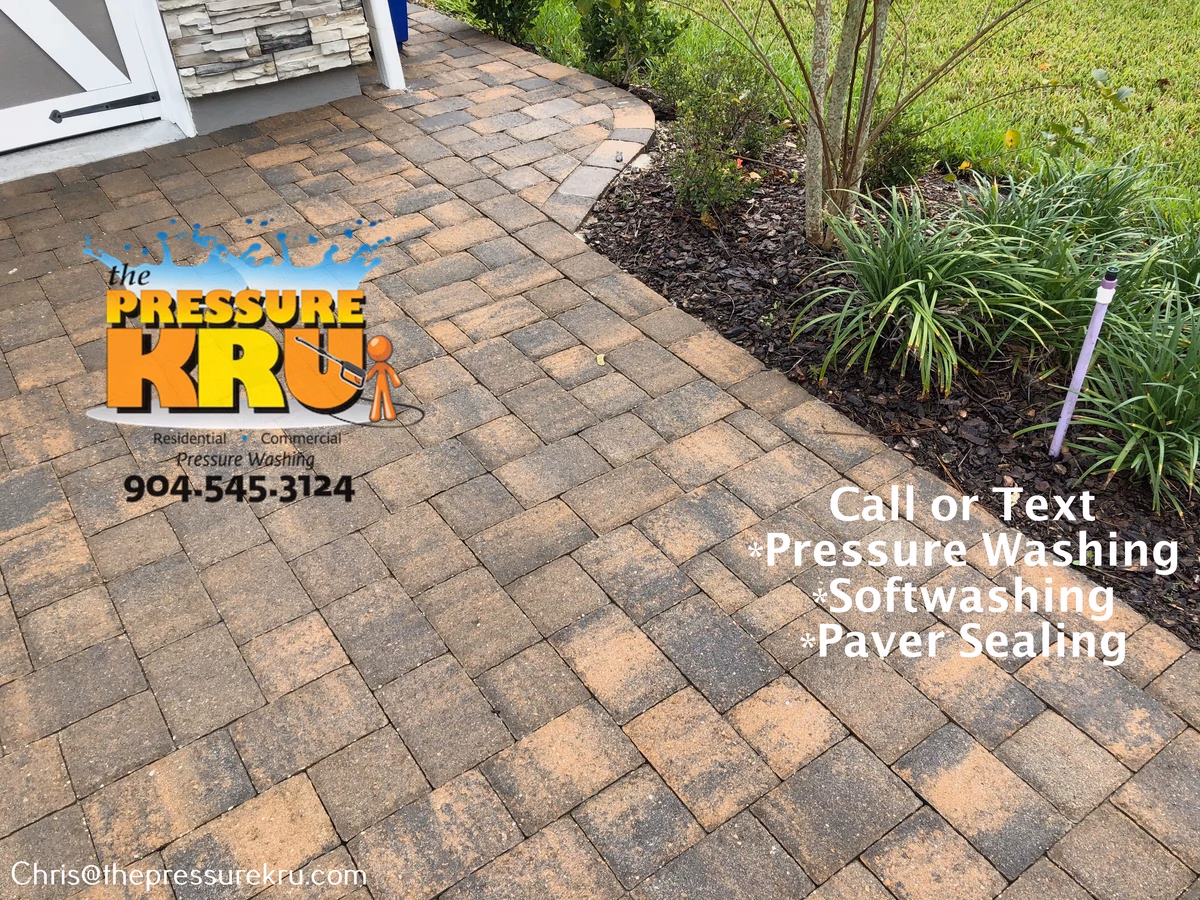 Clean restored paver driveway after professional pressure washing in Rivertown.