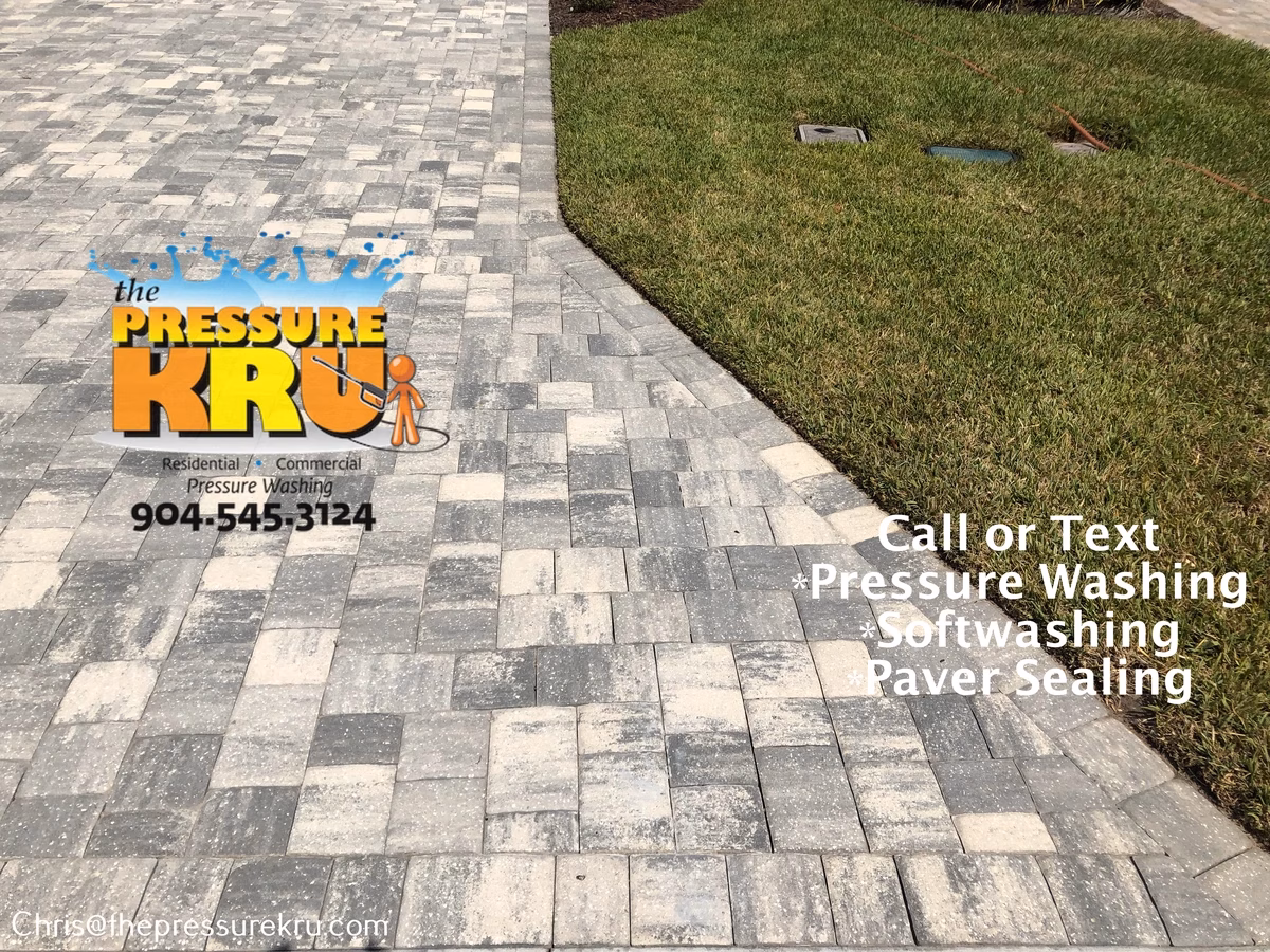 Paver driveway after pressure washing in Stillwater.