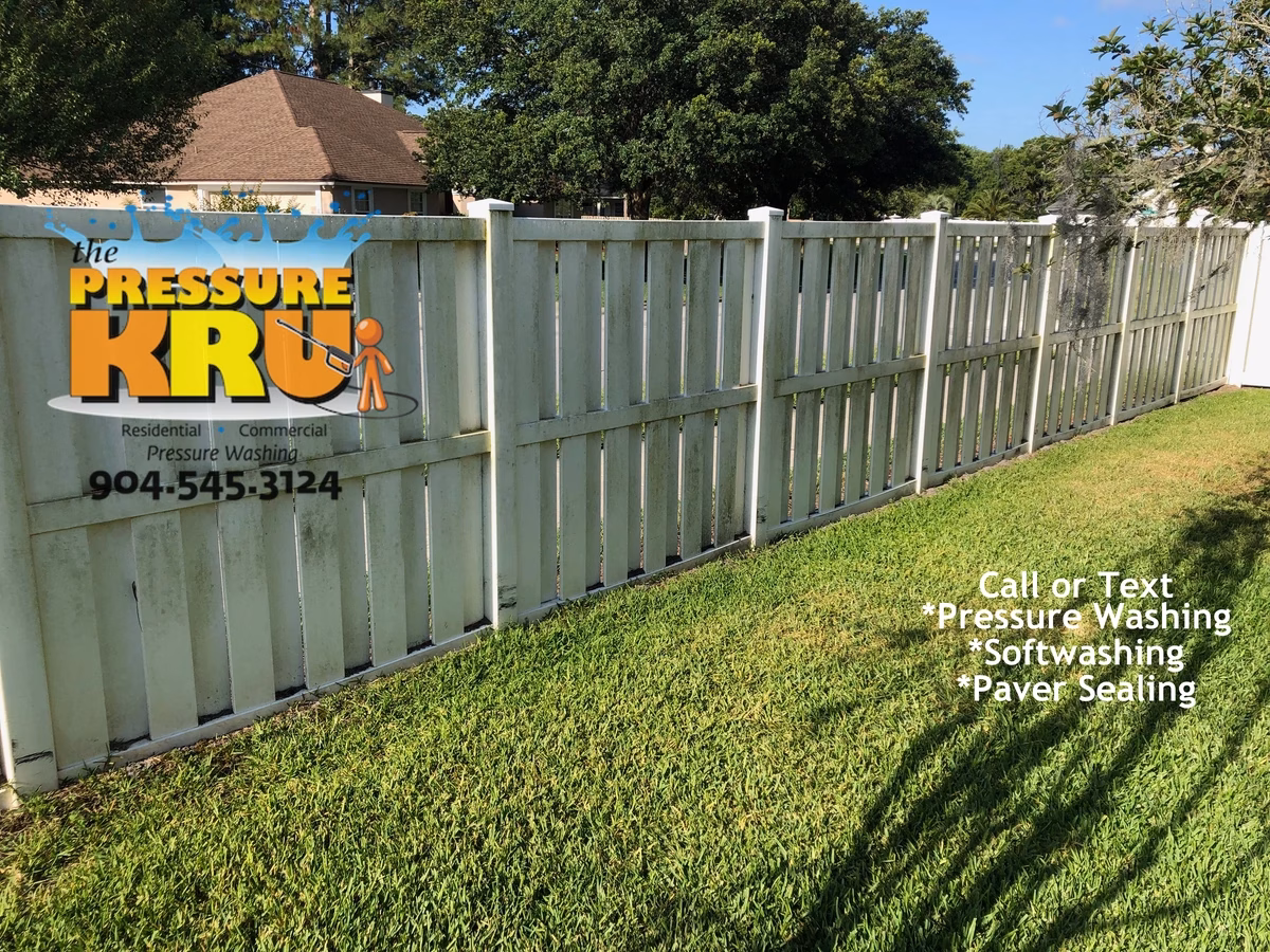 Professional fence cleaning in South Hampton showing green algae before cleaning