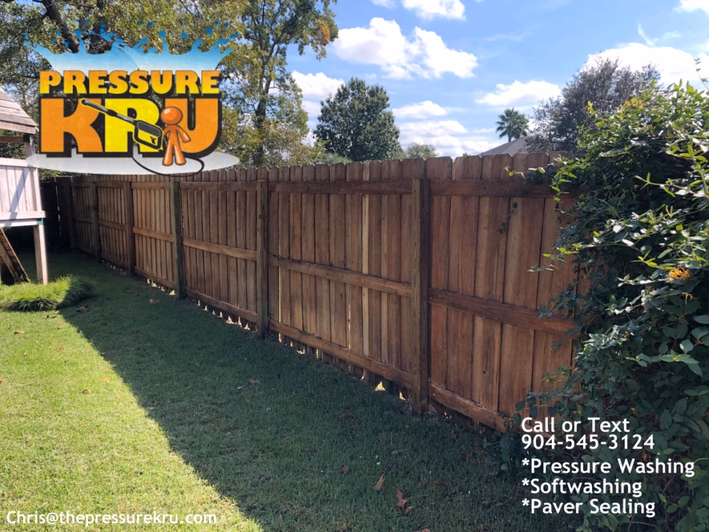wood fence after pressure washing and softwashing in Julington Creek Plantation