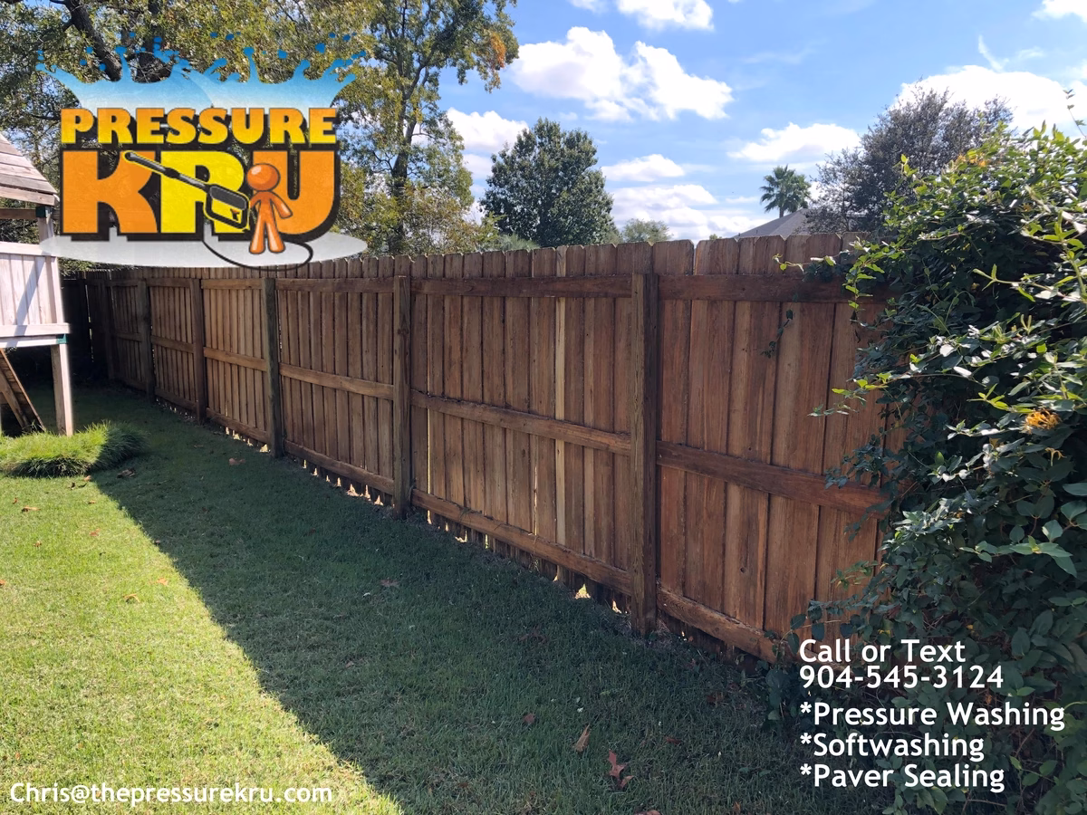 wood fence after pressure washing and softwashing in Julington Creek Plantation