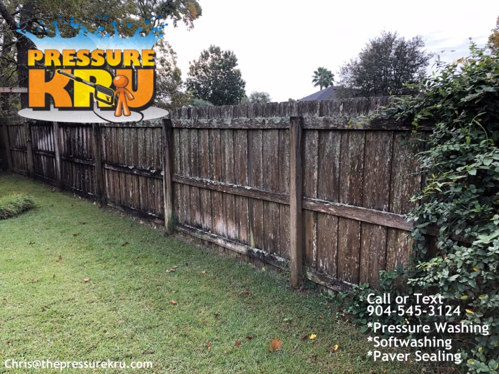 wood fence before pressure washing and softwashing in Julington Creek Plantation