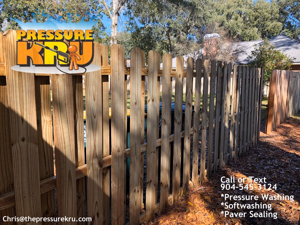 Wood fence after pressure washing in World Golf Village