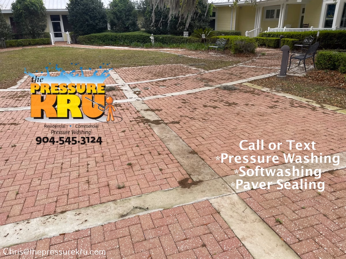 Paver patio pressure washing before cleaning in St. Augustine, FL.